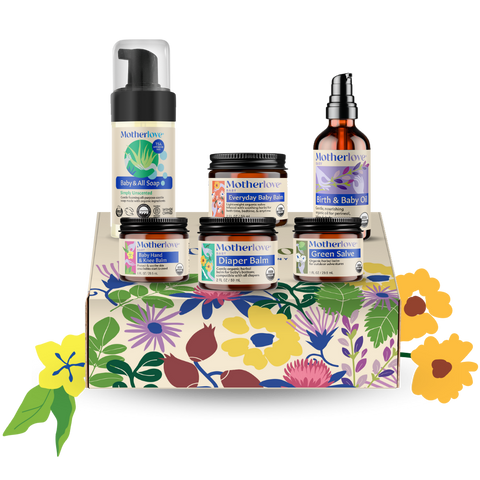 Collection of Motherlove baby care products on a floral-patterned box with decorative flowers.