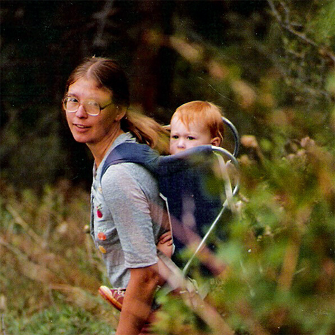 Our founder with her daughter in the 1980's walking in nature