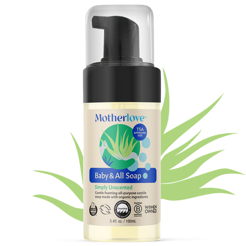 Bottle of Motherlove Baby and All Soap - Unscented with illustrated herbs behind the bottle