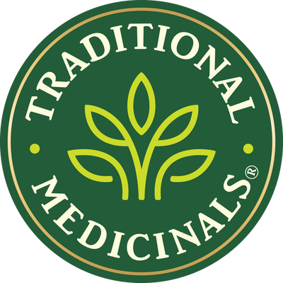Traditional Medicinals logo with green leaves on a dark green background